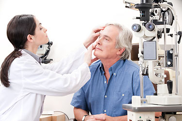 Patient consulting an ophthalmologist about vision changes